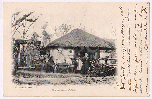 Postal antigo de um sapateiro